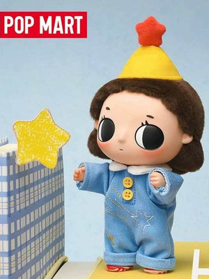 View the blue pajamas character close-up in the نومي بلايند بوكس series by pop mart, featuring authentic بلايند بوكس and صندوق غامض collectibles from بوب مارت.