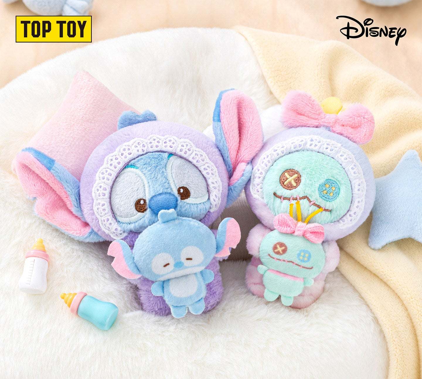 Stitch and Angel plush figures from the Disney Baby Dreams collection with baby bottles from Disney KSA