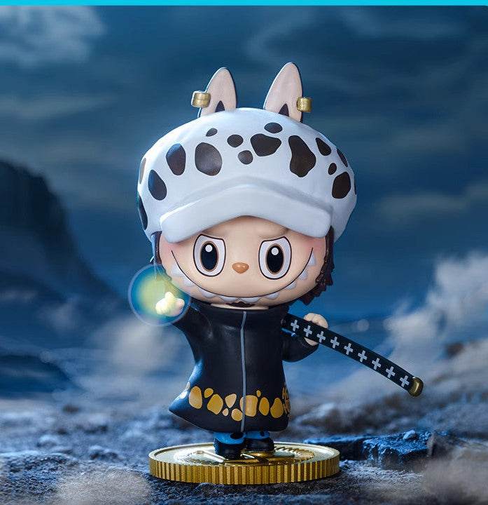 Close-up shot of Pop Mart Labubu The Monsters One Piece Trafalgar Law figure, available in Pop Mart KSA | لقطة قريبة لمجسم ترافلغار لو من سلسلة بوب مارت لابوبو ذا مونسترز ون بيس.